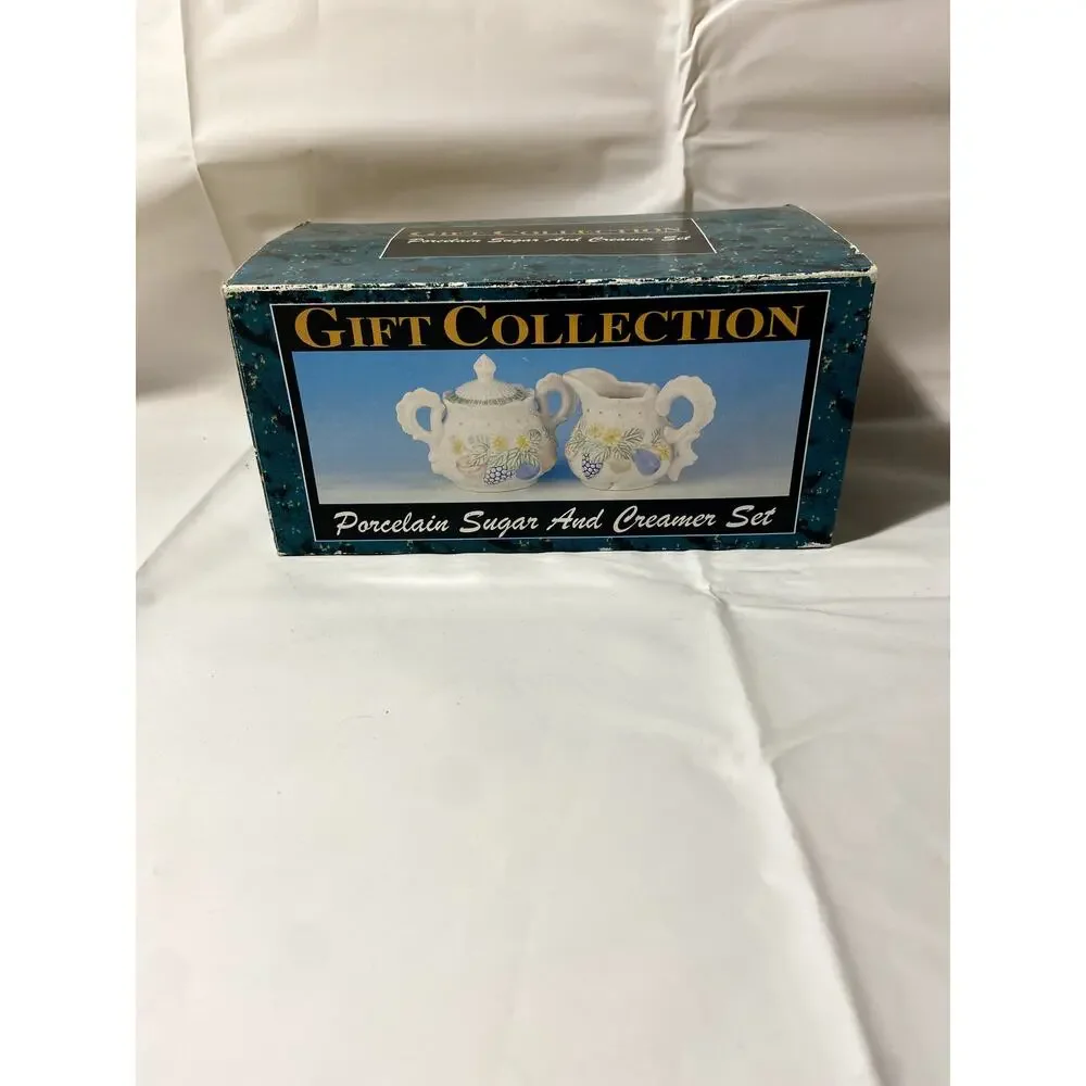 Porcelain sugar and creamer set